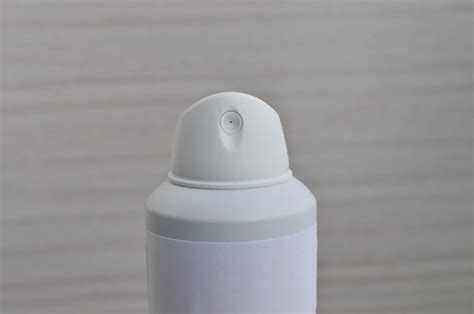 Premium Photo Closeup Of Spray Deodorant With White Label Conveying