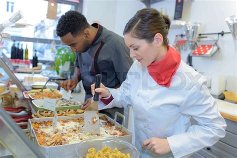 Lady Serving Food Stock Image Colourbox