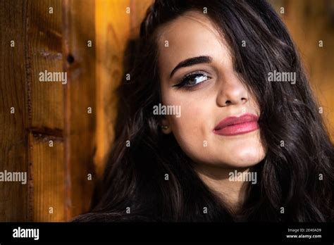 Portrait Of A Beautiful Brunette Girl With Hazel Eyes Stock Photo Alamy