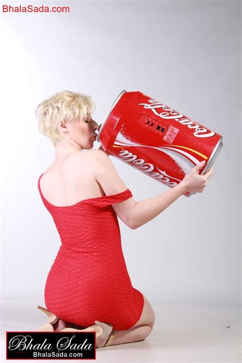 Smoking Hot Blonde Girl Loves Posing With A Big Coke Can Photos
