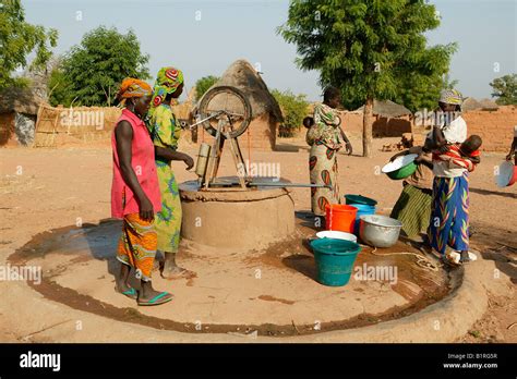 Women Getting Water From The Well Pakete Cameroon Africa Stock Photo