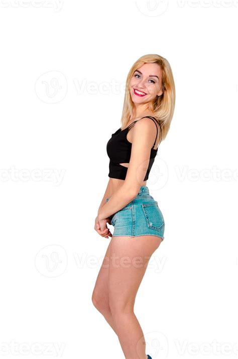 Blonde Girl Smiling On Camera In Studio Stock Photo At Vecteezy