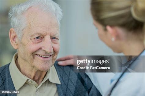 Comforting Doctor High-Res Stock Photo - Getty Images