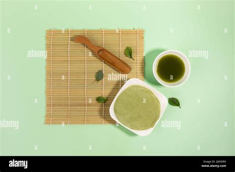 Matcha Green Tea Powder And Drink In Green Background Stock Photo Alamy