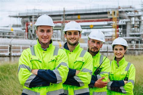 Group of oil and gas refinery engineer people worker standing happy