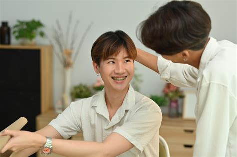 Premium Photo Happy Male Gay Couple Spending Time Together Creating Beautiful Bouquet With