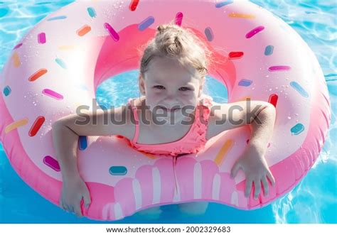 Beautiful Blonde Girl Lying On Lifebuoy Stock Photo 2002329683 Shutterstock