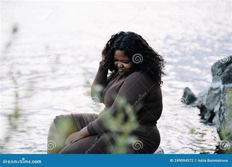 Smiling Shy Curly Plump Interracial African American Dark Skin Woman