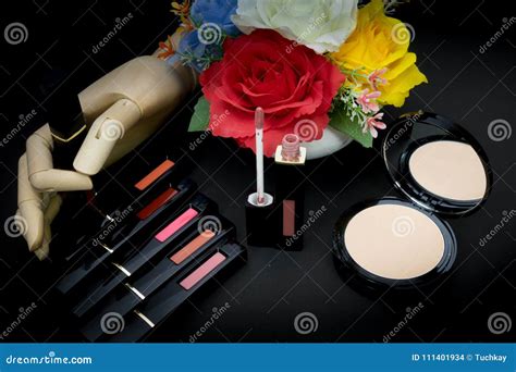 Lipstickpowder And Flowers With Cosmetics For Women To Make Her Stock