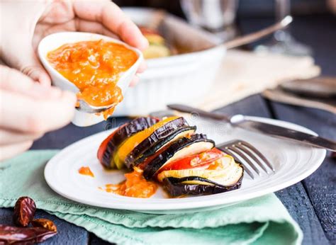 Ratatouille Served On White Round Plate And Serve The Sauce Stock