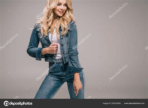 Attractive Blonde Woman Denim Jacket Jeans Smiling Looking Away Stock Photo AllaSerebrina