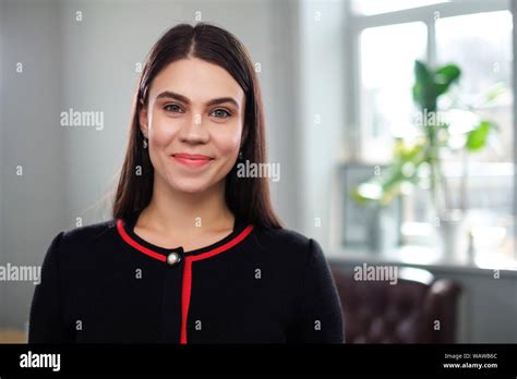 Portrait Of A Smiling Brunette Girl Stock Photo Alamy