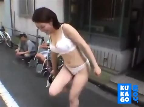 Japanese Girl Strips Naked In Crowded Area