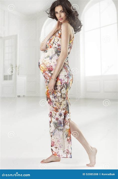 Brunette Pregnant Woman Wearing Flowered Dress Stock Photo Image Of