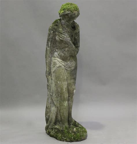 A Th Century Cast Composition Stone Garden Figure Of A Bathing Nude Maiden Height Cm