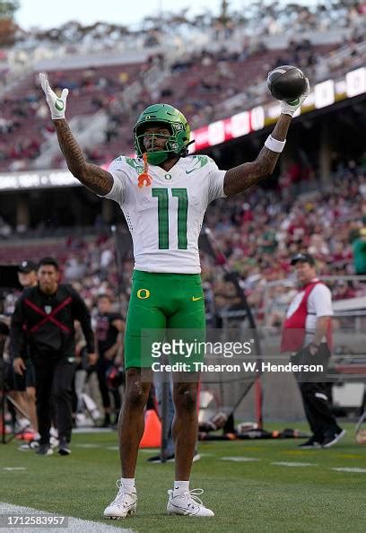Troy Franklin of the Oregon Ducks celebrates after scoring on a five ...