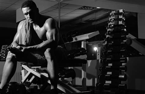 Premium Photo Resting After Training Man In Gym Sporty Male With Naked Torso Workout Guy