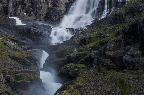 Trollstigen Road In Norway With Stone Bridge Waterfall And Dramatic ...