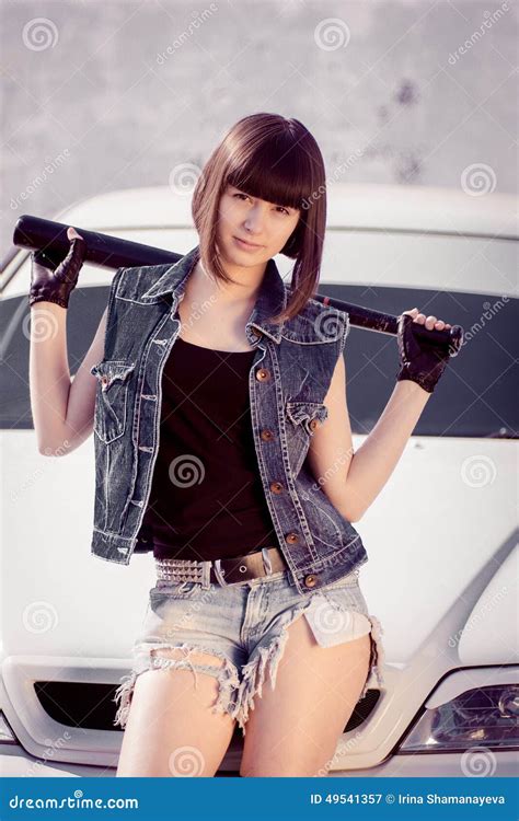 Brunette Girl In Short Denim Shorts With A Bat Stock Image Image Of