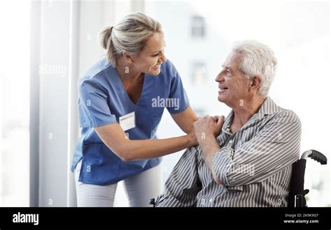 You Seem To Be Doing Much Better Today A Mature Female Nurse And Her Senior Male Wheelchair
