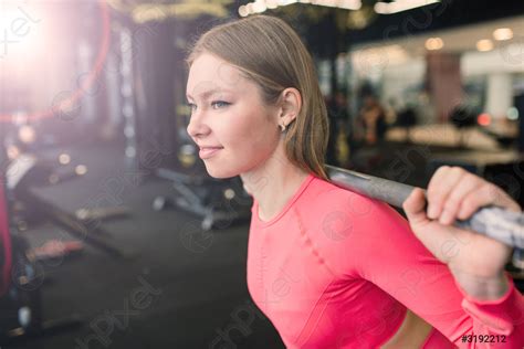 Beautiful Muscular Fit Blonde Woman Exercising Building Muscles In Gym Stock Photo 3192212