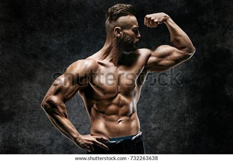 Naked Strong Man Showing His Biceps Stock Photo Edit Now 732263638