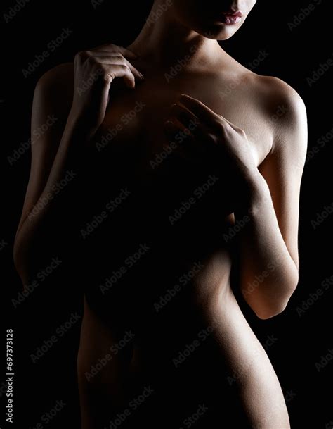 Nude Woman Silhouette In The Dark Beautiful Sexy Naked Girl Stock Photo Adobe Stock