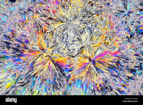 Microscopic View Of Citric Acid Crystals Polarized Light Crossed