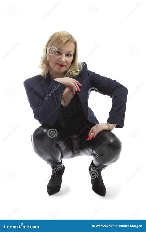 Relaxed Sitting Winsome Positive Winsome Mature Confident Caucasian Woman In Navy Blue Jacket