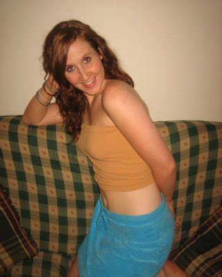 Teenage Redhead Ruby Strips Naked And Starts To Finger Her Tight Pussy