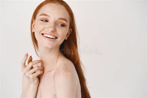 Close Up Of Pale Redhead Woman Standing Naked On White Background Turn