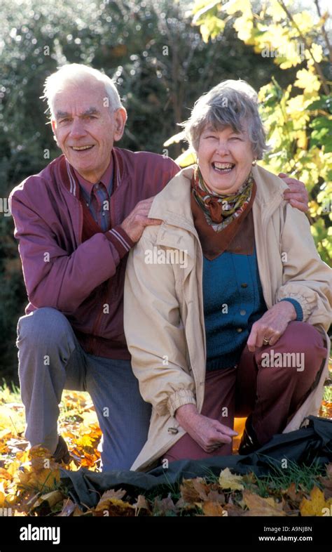 Portrait Happy Mature Couple On Autumn Day Stock Photo Alamy