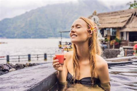 Premium Photo Geothermal Spa Woman Relaxing In Hot Spring Pool Against The Lake Hot Springs