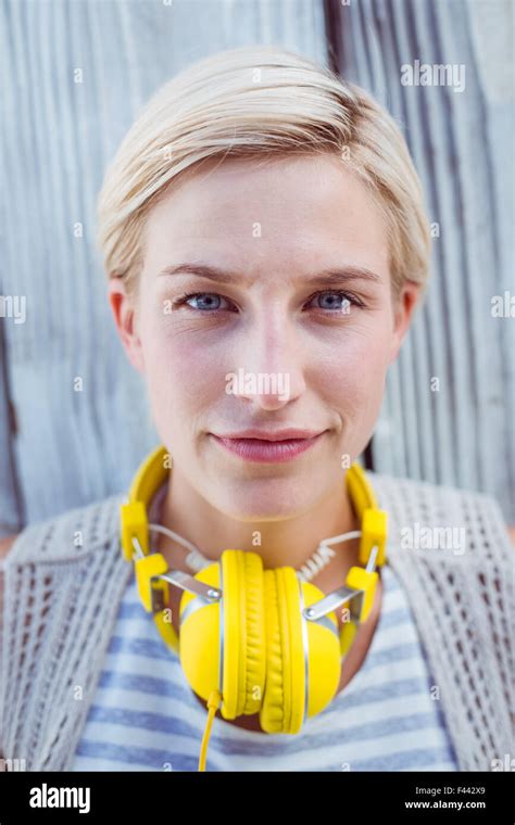 Pretty Blonde Woman Wearing Yellow Headset Stock Photo Alamy