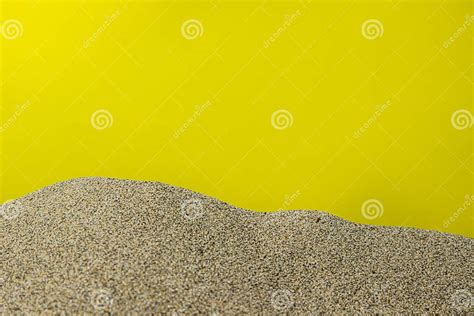 A Pile Of Sand On A Yellow Background Stock Image Image Of Pattern