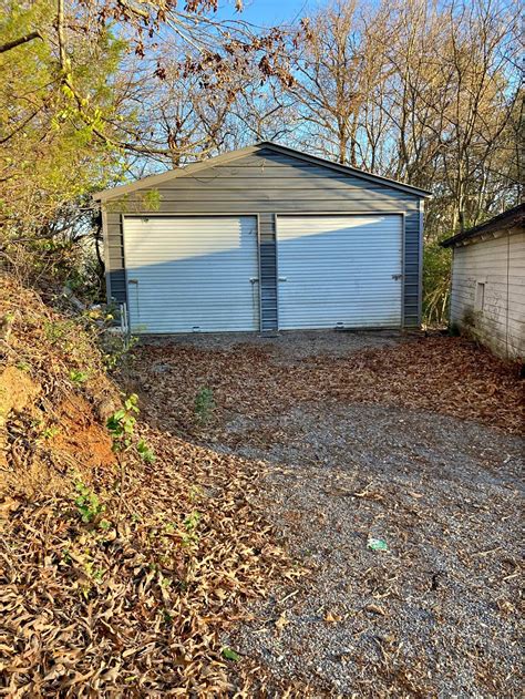 Large 2 door garage on concrete with power and a lift…available now