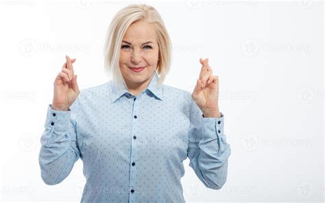 Half Length Portrait Of Beautiful Dreamy Blonde Wearing Blue Classic Blouse Standing Crossing