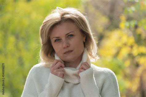 Middle Aged Blonde Woman On A Walk In The Autumn Park Disappointment Emotion Sadness Anger