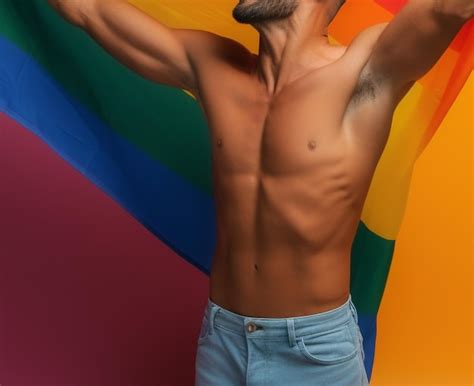 Premium Ai Image Expressive Pride Photo Of A Gay Man With A Rainbow Flag Pride Month