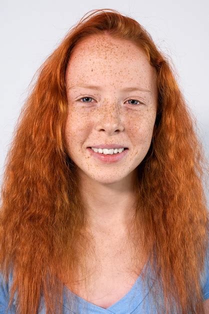 Premium Photo Portrait Of A Red Haired Girl With Lots Of Freckles On