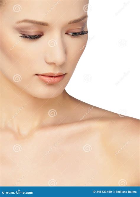 Girl With Perfect Healthy Spotless Skin Natural Makeup Nude Lips Looking Down Stock Photo