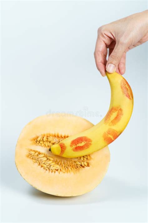Melon And Banana With Red Lipstick Marks On White Background Sex Concept Stock Image Image Of