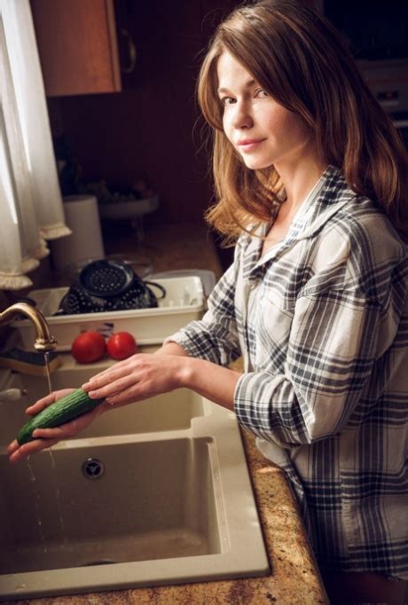 Attractive Teen Nedda A Strips Washes Her Hot Body In The Kitchen