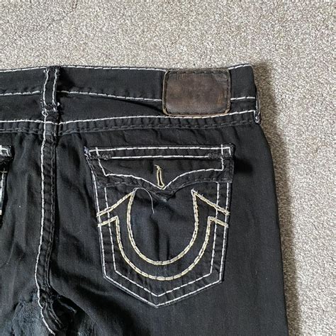 True Religion jeans in black w/white/gold... - Depop