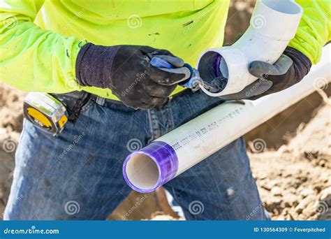 Plumber Applying Pipe Cleaner, Primer And Glue To PVC Pipes Royalty-Free Stock Image ...