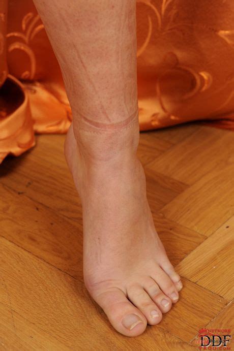 Sexy Brunette Kaily Strips To Her Boots And Shows Her Hot Feet And Pussy