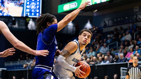 Rhode Island basketball's second-half surge downs Holy Cross