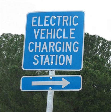 EV Charging Station sign | TheDetroitBureau.com