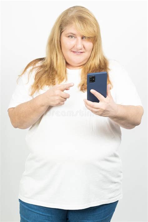 Smiling Blonde Plus Size Woman Holding Smartphone Stock Image Image