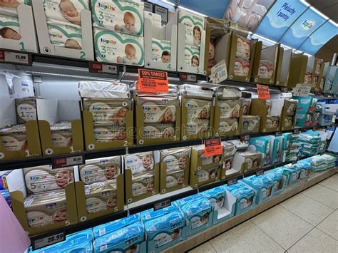 Warsaw Poland June 27 2025 Diaper Aisle In A Retail Store Showcasing Various Brands And